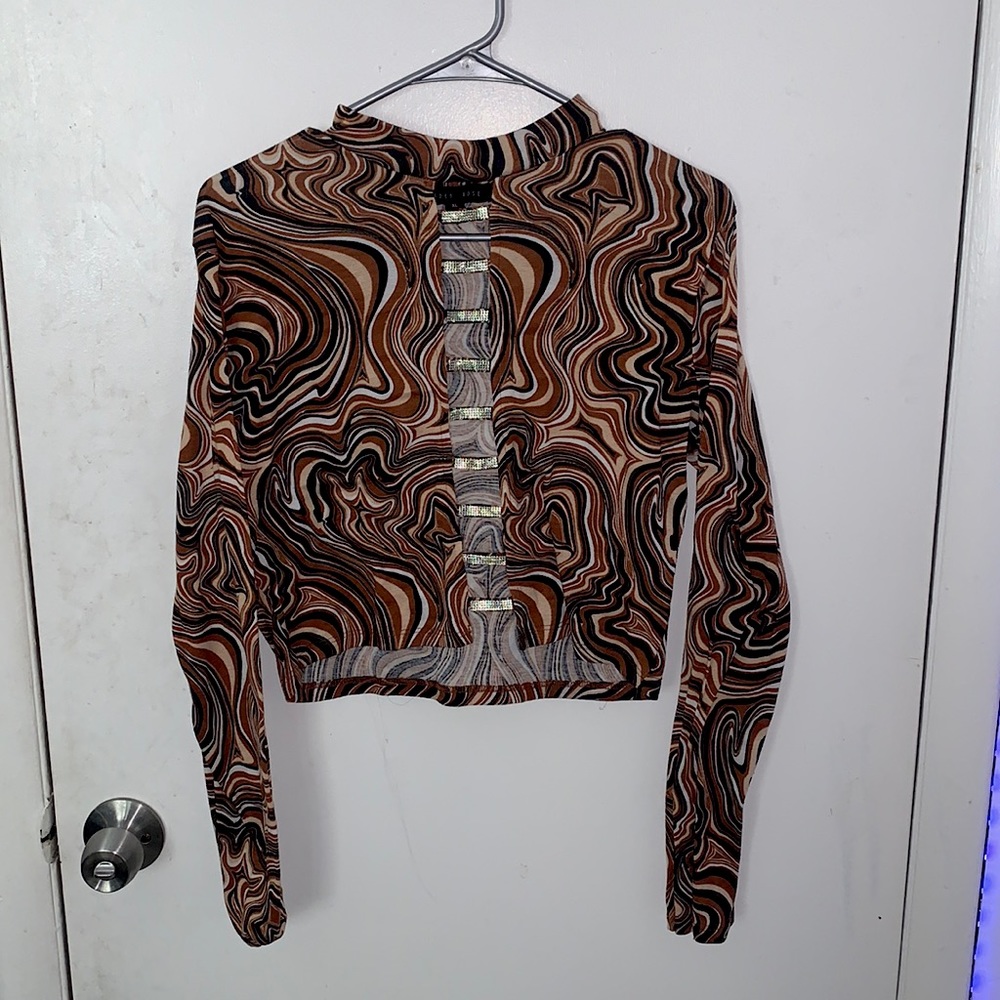 Cropped brown white tan black shirt front is the open part